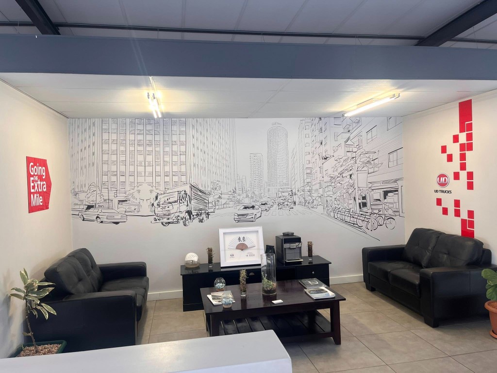 Corporate reception with skyline wallpaper and vinyl wall graphics